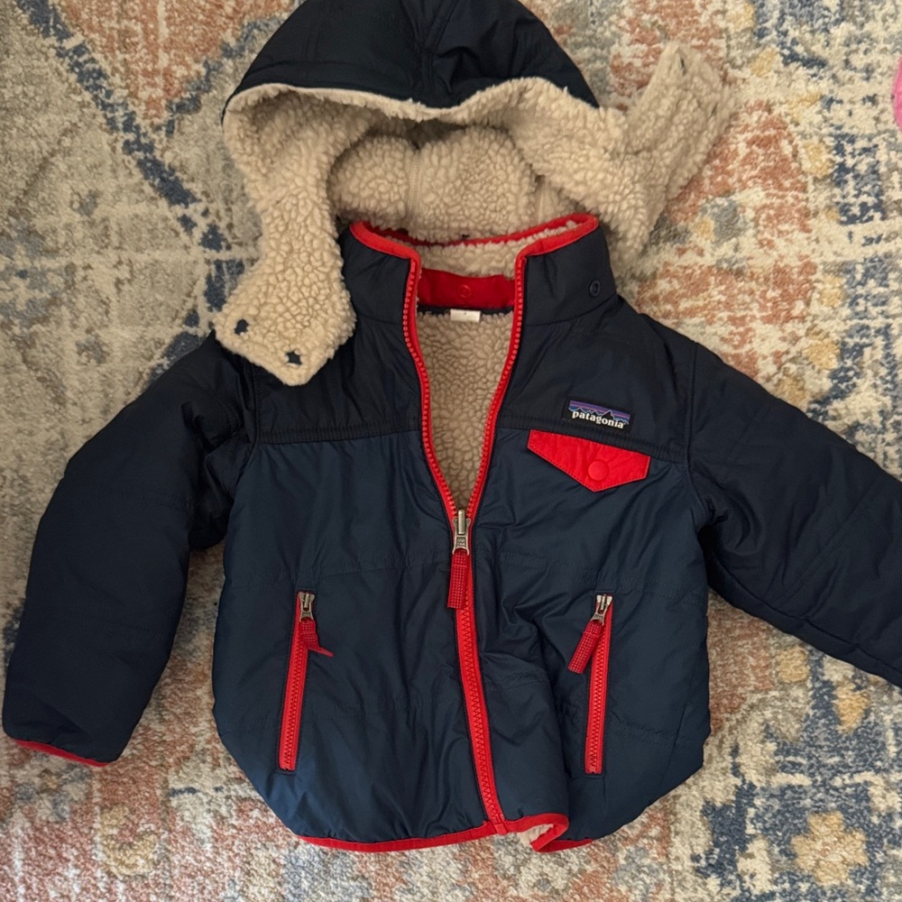 Patagonia Dark Blue Jacket with Red Trim